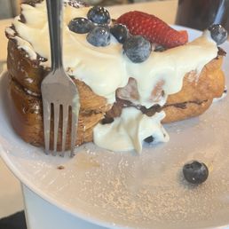 Guava and Cheese French toast!! The guava is layered between the 2 slices with their famous cheese lavishly covering the top!! Guava and Cheese French toast!! The guava is layered between the 2 slices with their famous cheese lavishly covering the top!!