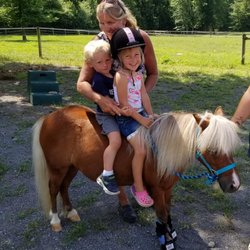 Skye and Owen riding Bullseye