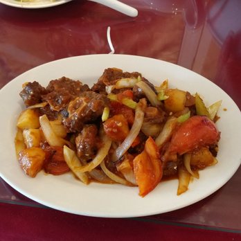 Pho Minh's - Oxtail, tomato, and onion in sauce - like sweet and sour. Some oxtail wasn't cooked enough and still tough - Vietnamese Near Me - Linden, New Jersey Pho Minh's - Oxtail, tomato, and onion in sauce - like sweet and sour. Some oxtail wasn't cooked enough and still tough - Vietnamese Near Me - Linden, New Jersey