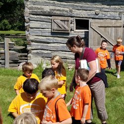Farmamerica - Day camp students visit Farmamerica's 1850s farm site.