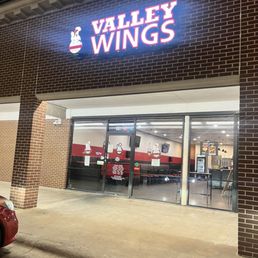 Exterior outside entrance of Valley Wings Dallas - Outside of store - Dallas, Texas Exterior outside entrance of Valley Wings Dallas - Outside of store - Dallas, Texas