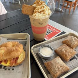 Cookie butter latter, breakfast sandwich, cinnamon sugar beignets with icing. Cookie butter latter, breakfast sandwich, cinnamon sugar beignets with icing.