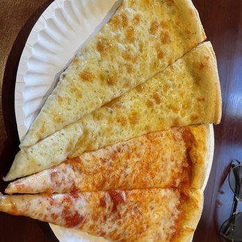 Nina's Pizzeria and Restaurant - Garlic Cheese Slice and Regular Slice - Pizza Near Me - Oneonta, New York Nina's Pizzeria and Restaurant - Garlic Cheese Slice and Regular Slice - Pizza Near Me - Oneonta, New York