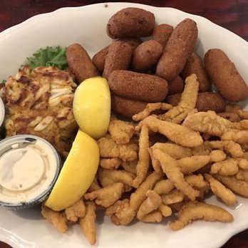 Avery's Maryland Grill - Crab cake with hush puppies and clam strips - Seafood Near Me - Frederick, Maryland Avery's Maryland Grill - Crab cake with hush puppies and clam strips - Seafood Near Me - Frederick, Maryland