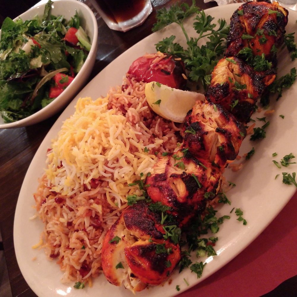 Kaban Persian Restaurant - Chicken Shish Kabob with Zereshk polo and a side salad. - Persian/Iranian Near Me - Los Angeles, California Kaban Persian Restaurant - Chicken Shish Kabob with Zereshk polo and a side salad. - Persian/Iranian Near Me - Los Angeles, California