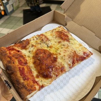 Micucci Grocery - Cheese slab - Pizza Near Me - Portland, Maine Micucci Grocery - Cheese slab - Pizza Near Me - Portland, Maine