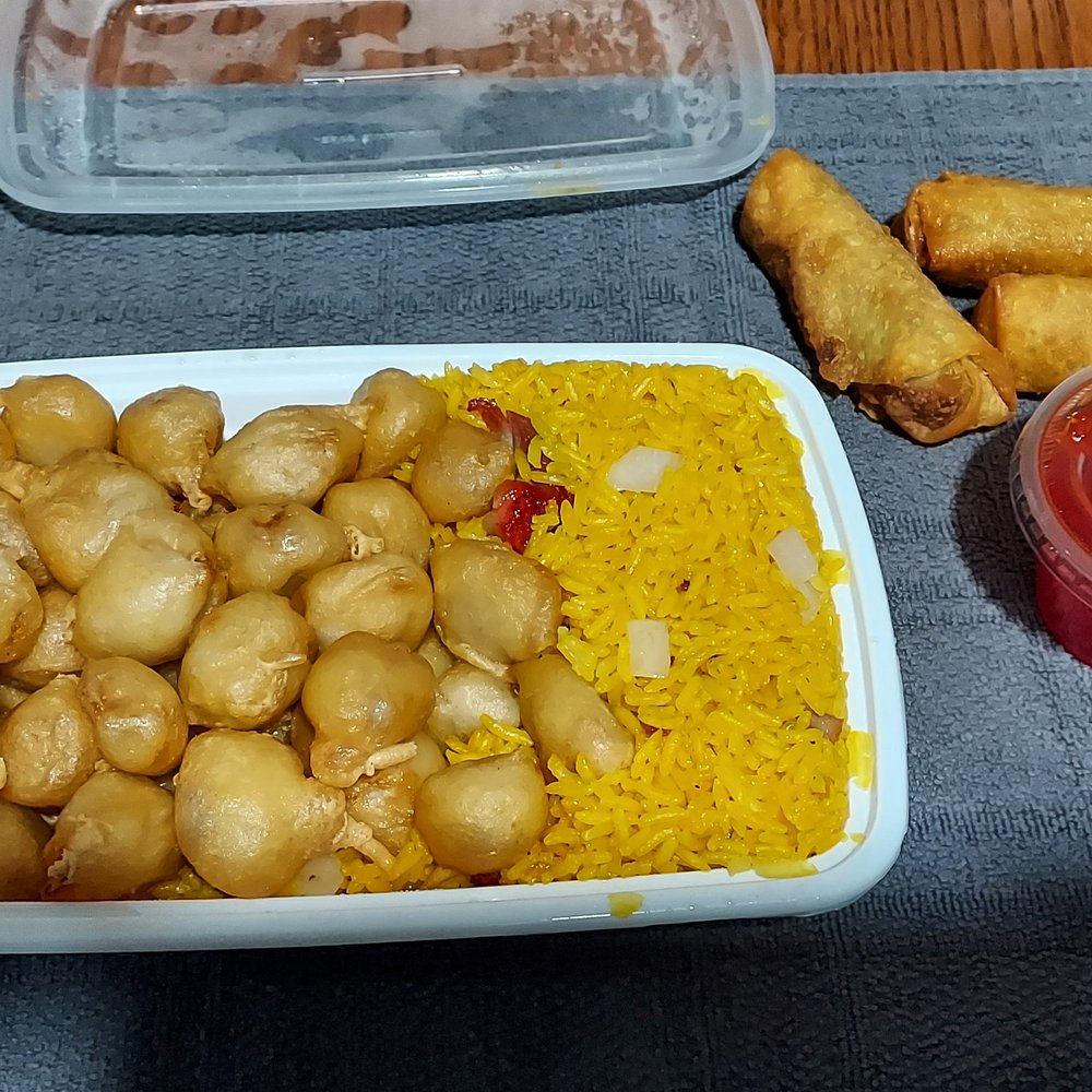 a plate of food and a drink a plate of food and a drink