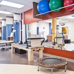 PhysioActive Orthopaedic & Sports Injury Centre - Pilates reformer and exercise area.