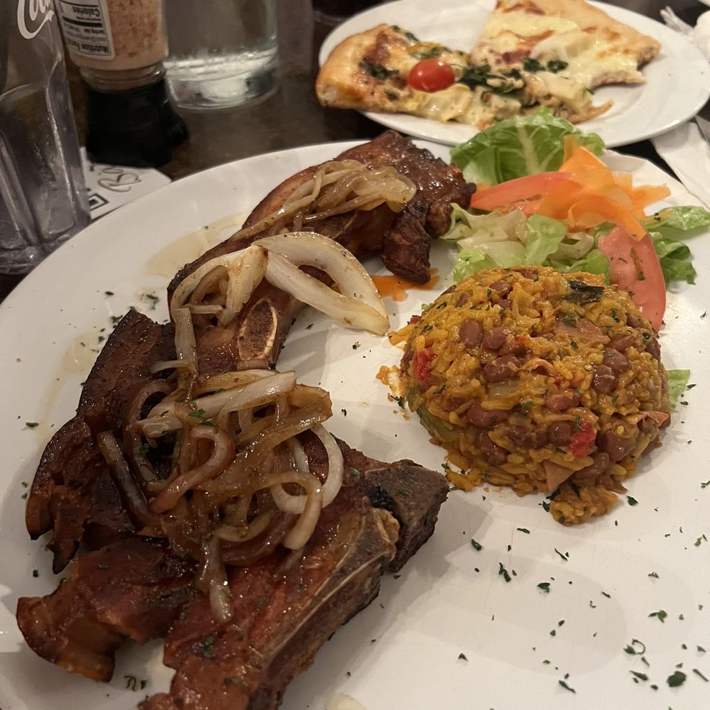 Bari - Chuleta can can (fried pork rib) and rice and beans - Pizza Near Me - San Juan, Puerto Rico Bari - Chuleta can can (fried pork rib) and rice and beans - Pizza Near Me - San Juan, Puerto Rico