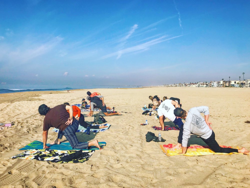 Sunset Beach Yoga Tower 28 Logo
