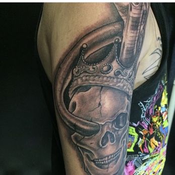 Ink Love Tattoos - Skull with snake black and grey - Piercing Near Me Ink Love Tattoos - Skull with snake black and grey - Piercing Near Me