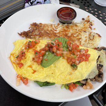 Broken Yolk Cafe - Omelette w/pico, avo, mushrooms, spinach and onion. Side of hash browns - Breakfast & Brunch Near Me - Costa Mesa, California
