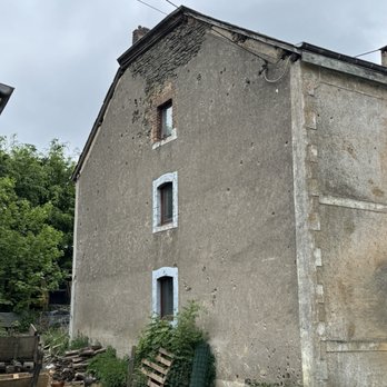 Bastogne War Museum - A battle damaged building in Foy. - Museums Near Me - Bastogne, WLX