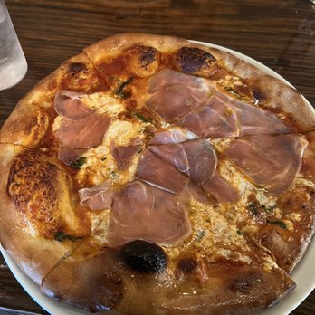 1803 Pizza Kitchen - BPT pizza with prosciutto, burrata, garlic cream sauce and truffle oil - Pizza Near Me - Orlando, Florida 1803 Pizza Kitchen - BPT pizza with prosciutto, burrata, garlic cream sauce and truffle oil - Pizza Near Me - Orlando, Florida