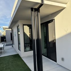 Gonzalez Gutter Services - 5" Fascia Gutter with 2x3 Smooth Downspout