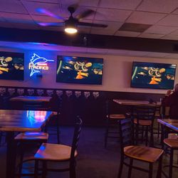 Outlaws Grill and Saloon - Multiple screens for sports