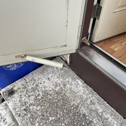 Two Men and a Truck Moving - Damaged storm door