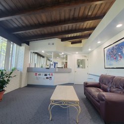 Hart H Lee DDS - Part of the waiting area, clean and seats are placed away from each other for sufficient distancing.