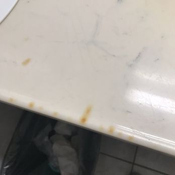 Days Inn by Wyndham Slidell - Cigarette burned counter top - Hotels Near Me - Slidell, Louisiana