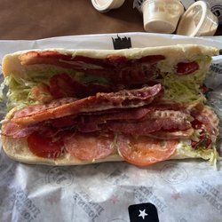 Jimmy John's - I asked for extra tomatoes which normal is 6-7 tomatoes for that and I asked for extra lettuce. Sloppy and made by the general manager.
