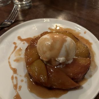 Agustin Kitchen - Peach cobbler something. Order as soon as you sit down, they sell out every night! - New American Near Me - Tucson, Arizona