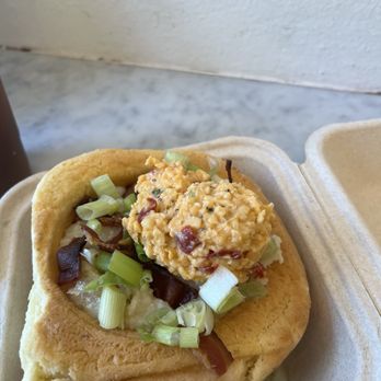 Callie's Hot Little Biscuit - Grits with bacon and pimento cheese in a biscuit cup - Breakfast & Brunch Near Me - Charleston, South Carolina Callie's Hot Little Biscuit - Grits with bacon and pimento cheese in a biscuit cup - Breakfast & Brunch Near Me - Charleston, South Carolina