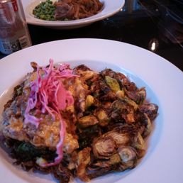Chicken Schnitzel with Brussels sprouts (front). English-style London broil pot roast with mash and peas (back). Chicken Schnitzel with Brussels sprouts (front). English-style London broil pot roast with mash and peas (back).