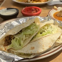 3 Soft Beef Tacos and chicken nachos (I think?)