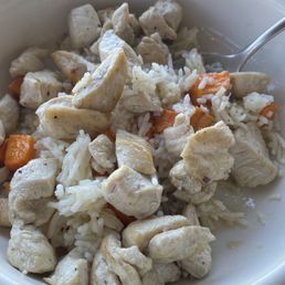 Chicken with vegetables and rice for dogs.