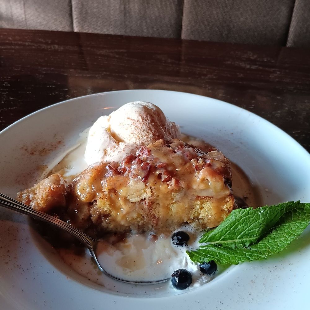 Appalachian Grill - Bread pudding with sliced unseasoned apples - American Near Me - Cartersville, Georgia Appalachian Grill - Bread pudding with sliced unseasoned apples - American Near Me - Cartersville, Georgia