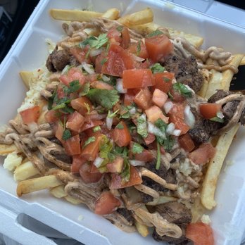 The Jerk Next Door - Jerk chicken fries - Caterers Near Me