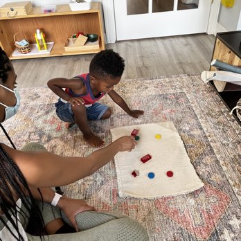 El Nido - Playing a game with mommy - Montessori Schools Near Me - Missouri City, Texas El Nido - Playing a game with mommy - Montessori Schools Near Me - Missouri City, Texas