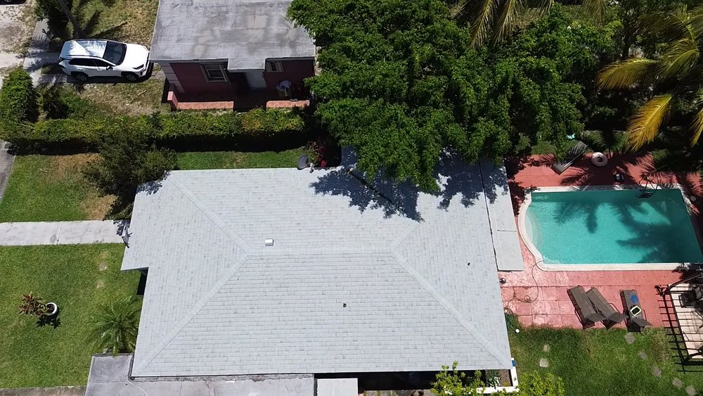 Slide of MC Roofing Service