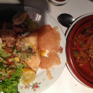 Photo of Chez Hamadi - Paris, France. Mixed Appetizer and Lamb Tagine