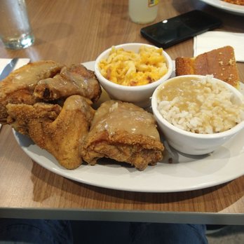 Manna - Smothered fried chicken Special.  With Mac n Cheese and Rice n Gravy - Soul Food Near Me - Buffalo, New York