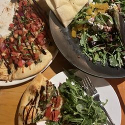 Di Gusto - Arugula salad and bruschetta. So yummy!