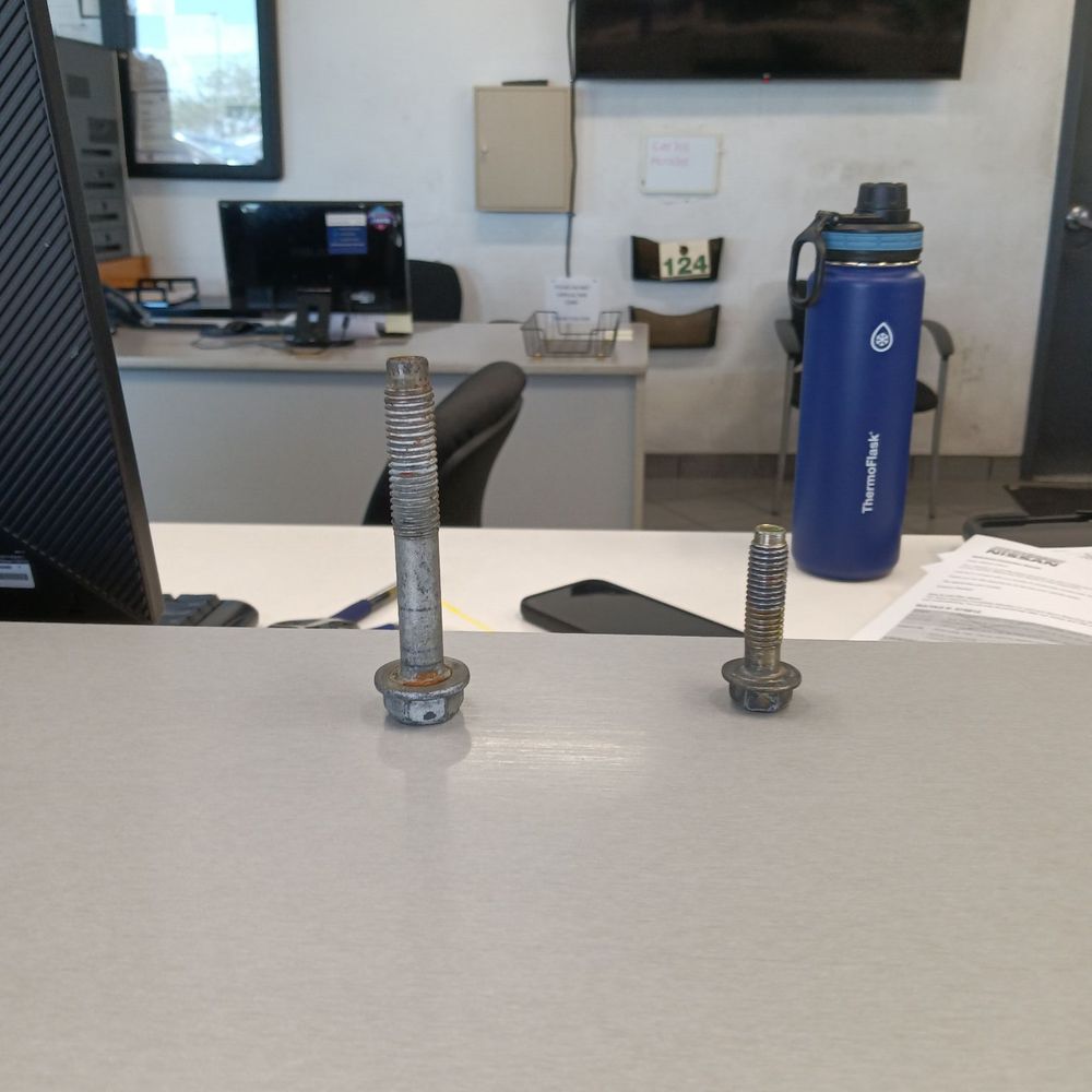 These are stripped bolts that and sent me to Nissan to get that it fixed how do they strips of bolts These are stripped bolts that and sent me to Nissan to get that it fixed how do they strips of bolts