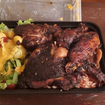 Olivias Catering & Dining - Jerk Chicken with rice & peas and a salad with oxtail gravy on the rice. - Caribbean Near Me - Rahway, New Jersey
