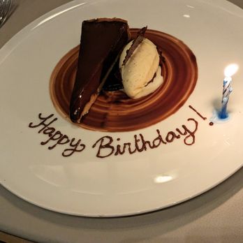 Essential by Christophe - Warm Manjari Chocolate Tart with Madagascar Vanilla Ice Cream - French Near Me - New York, New York