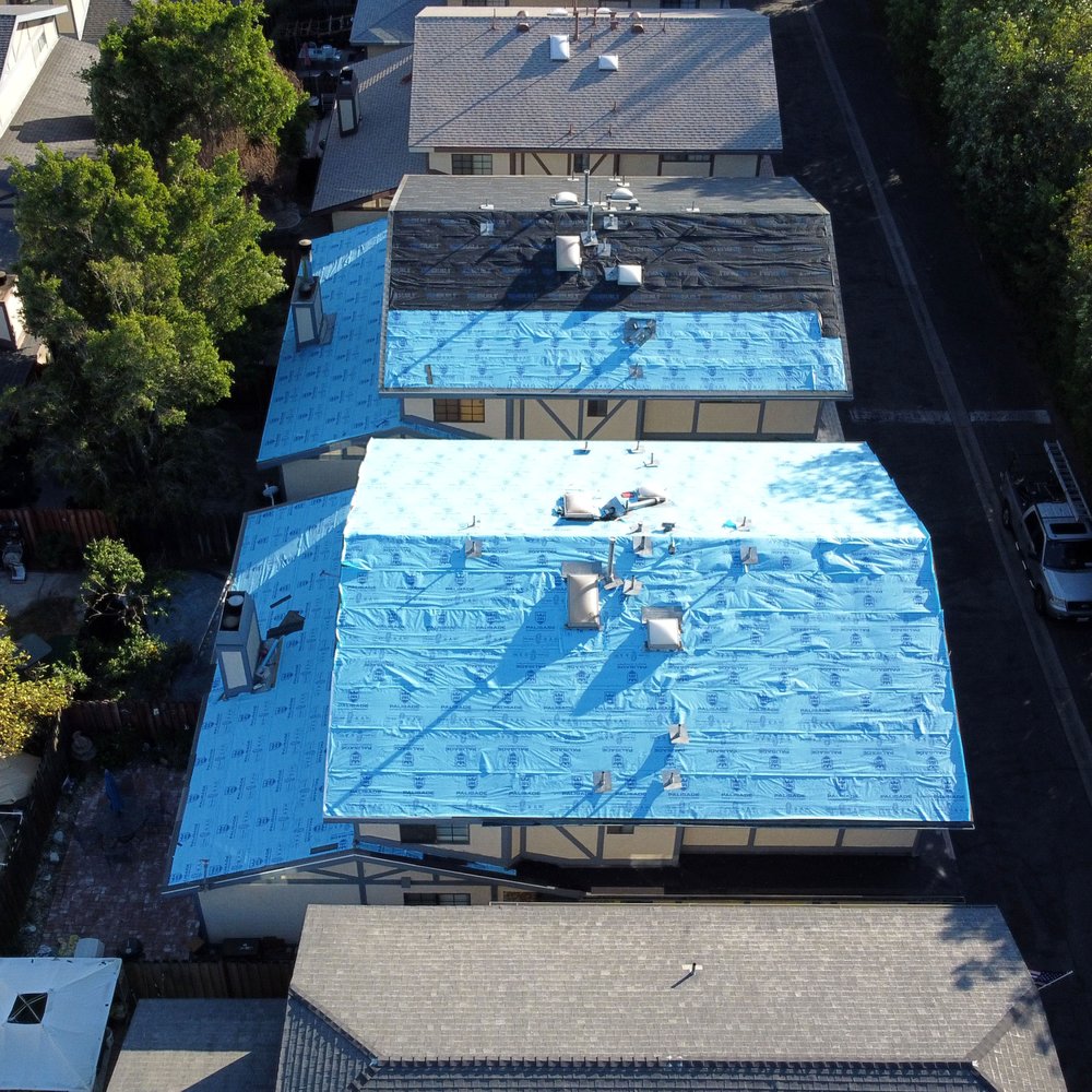 Slide of Mega Roofing