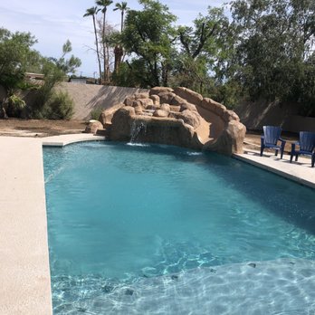 Desert Solutions - a pool with a rock slide - General Contractors Near Me - Scottsdale, Arizona Desert Solutions - a pool with a rock slide - General Contractors Near Me - Scottsdale, Arizona