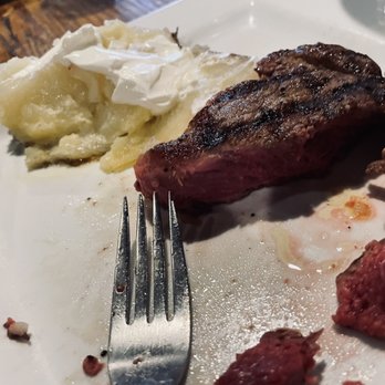 Porter Jacks Grill - Aperfectly cooked medium-rare ribeye steak. accompanied by wine. Shame on Hampton Inn for not recommending this restaurant... twice!! - American Near Me - Manning, South Carolina