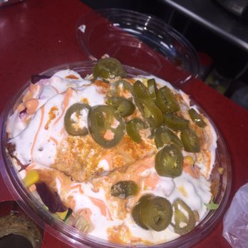Halal Bros Grill - All that goodness my salmon salad with jalapeños,white sauce - Halal Near Me - Queens, New York Halal Bros Grill - All that goodness my salmon salad with jalapeños,white sauce - Halal Near Me - Queens, New York