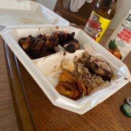 Ox tails and jerk chicken combination plate. Tru Juice and pineapple ginger drink!!!!! Man to die for, everything was just right. Ox tails and jerk chicken combination plate. Tru Juice and pineapple ginger drink!!!!! Man to die for, everything was just right.