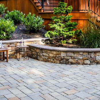 More Than Just Landscaping - a brick patio with a stone bench - Landscaping Near Me - Phoenix, Arizona More Than Just Landscaping - a brick patio with a stone bench - Landscaping Near Me - Phoenix, Arizona