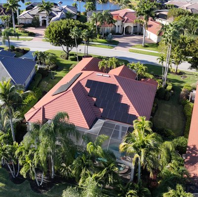 Naples, FL residential rooftop solar installation - 14.24 kW residential rooftop solar installation in Naples, FL featuring Enphase microinverters an Canadian Solar module by Stilwell Solar, licensed solar electric contractor serving Collier, Lee, and Charlotte Counties in Southwest Florida