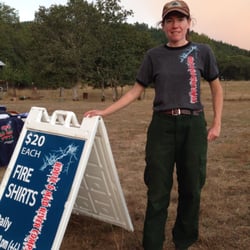 Eureka Shirt Circuit - A firefighter during the 2015 California Wildfire Season happily wearing her shirt from Eureka Shirt Circuit.