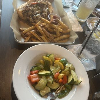Foxiis Restaurant & Bar - Philly cheese, steak sandwich, fries, and the vegetable medley - American Near Me - Murphy, Texas
