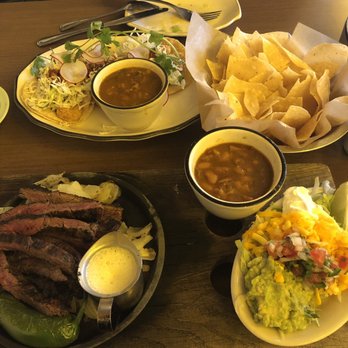 Superica - Bottom: Skirt steak fajitas Top: Tacos de camarones - Tex-Mex Near Me - Atlanta, Georgia Superica - Bottom: Skirt steak fajitas Top: Tacos de camarones - Tex-Mex Near Me - Atlanta, Georgia