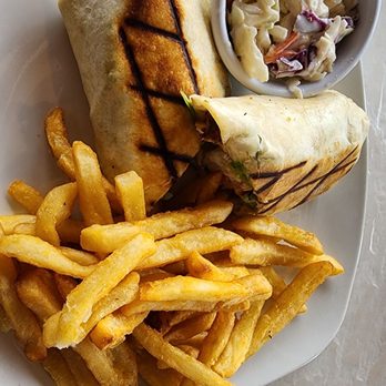 Sunset Cafe Waterfront Grill & Bar - Grouper wrap - Seafood Near Me - Cocoa Beach, Florida Sunset Cafe Waterfront Grill & Bar - Grouper wrap - Seafood Near Me - Cocoa Beach, Florida